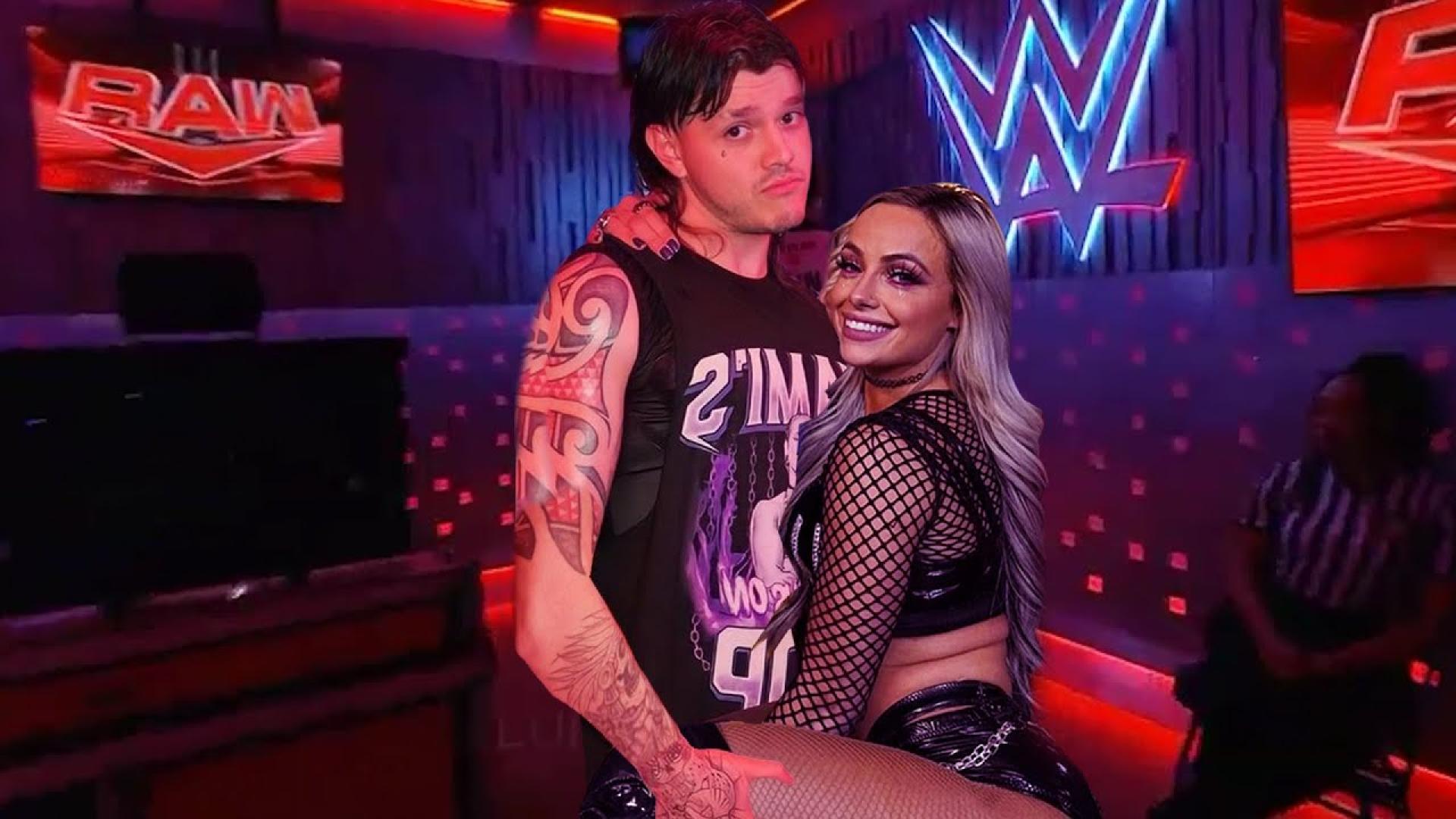 Dominik Mysterio shows off the celebrations with Liv